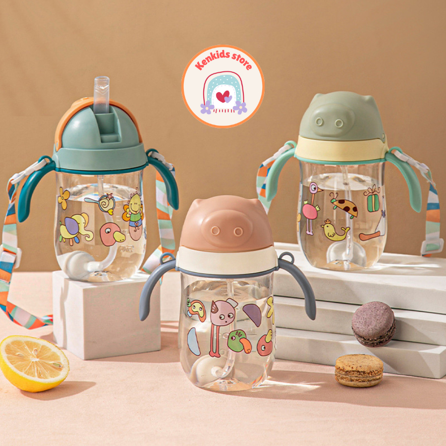 Bình nước cho bé KK23050 Bình uống nước Bình nước em bé có tay cầm và dây đeo hình heo dễ thương cho bé Kenkids Store