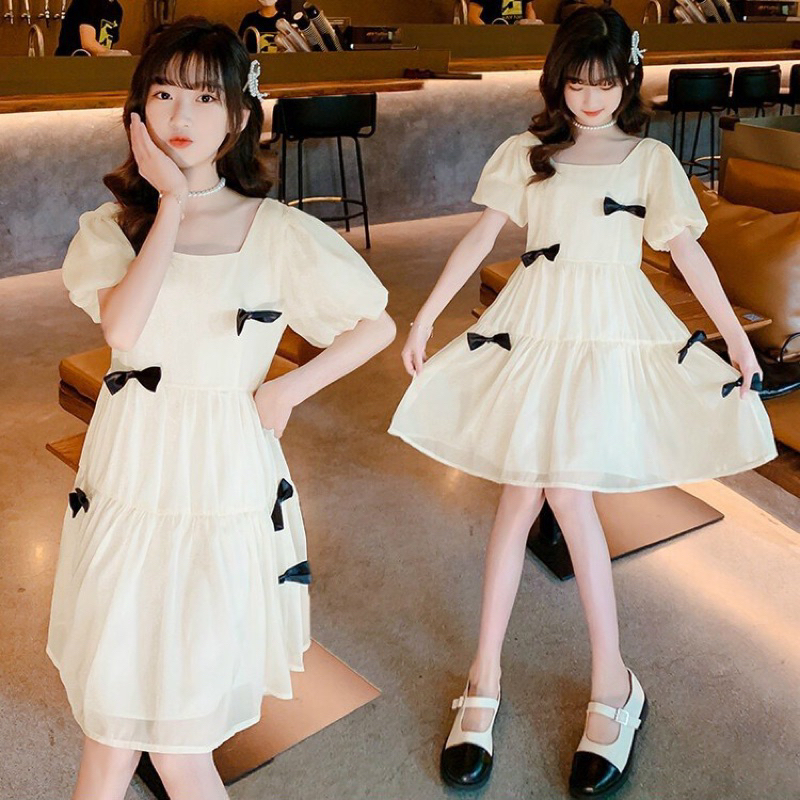 Đầm nơ cho cả  mẹ và bé