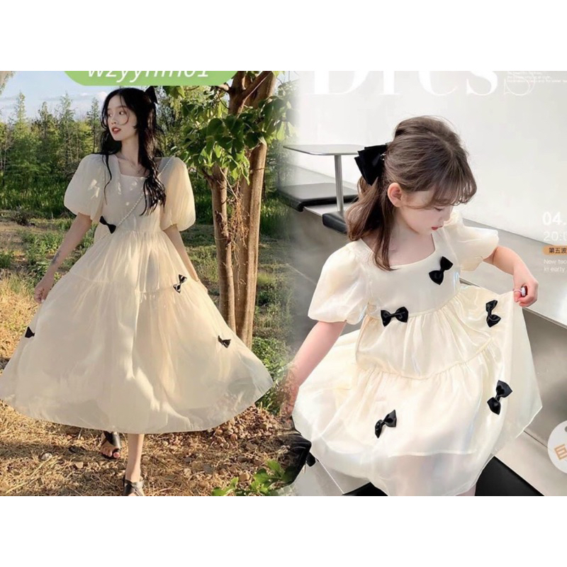 Đầm nơ cho cả  mẹ và bé