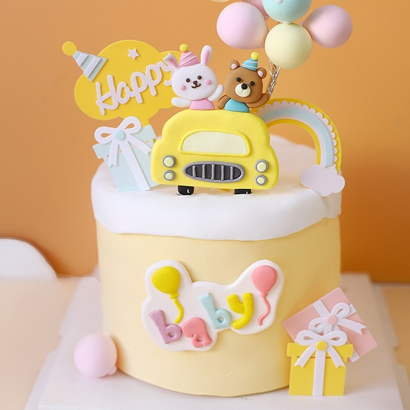 Trang trí gốm mềm gấu + thỏ lái xe oto màu vàng