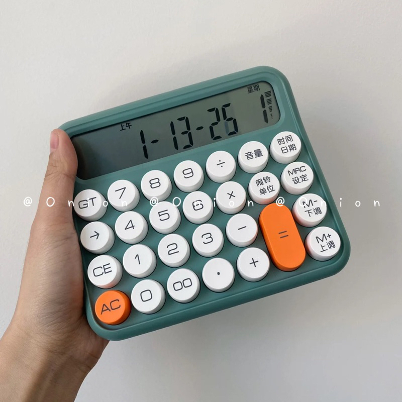 Máy tính cầm tay Juno phím nổi