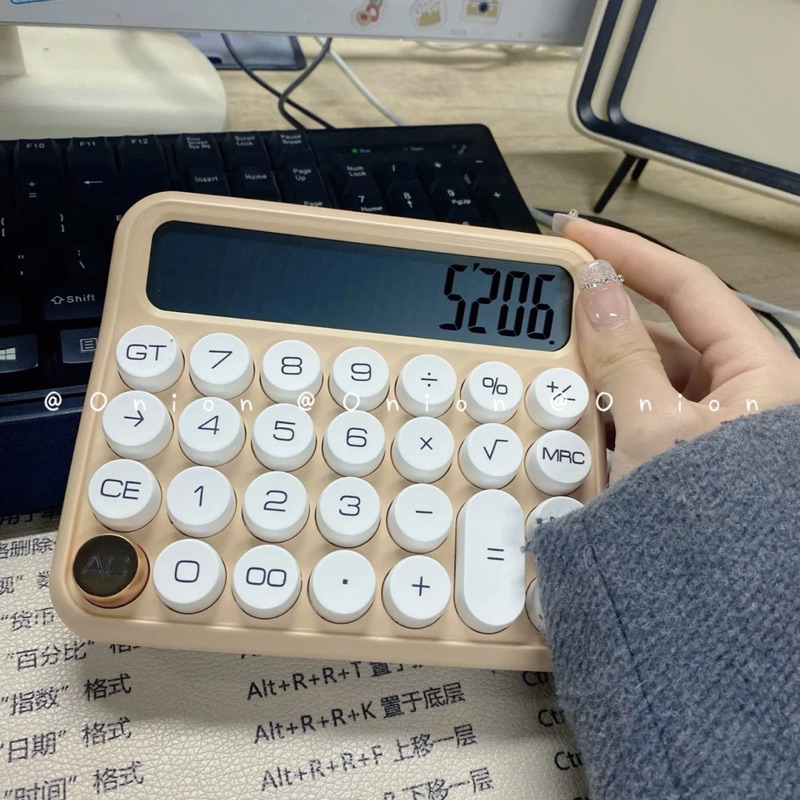 Máy tính cầm tay Juno phím nổi