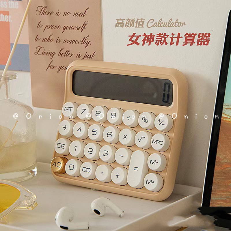 Máy tính cầm tay Juno phím nổi