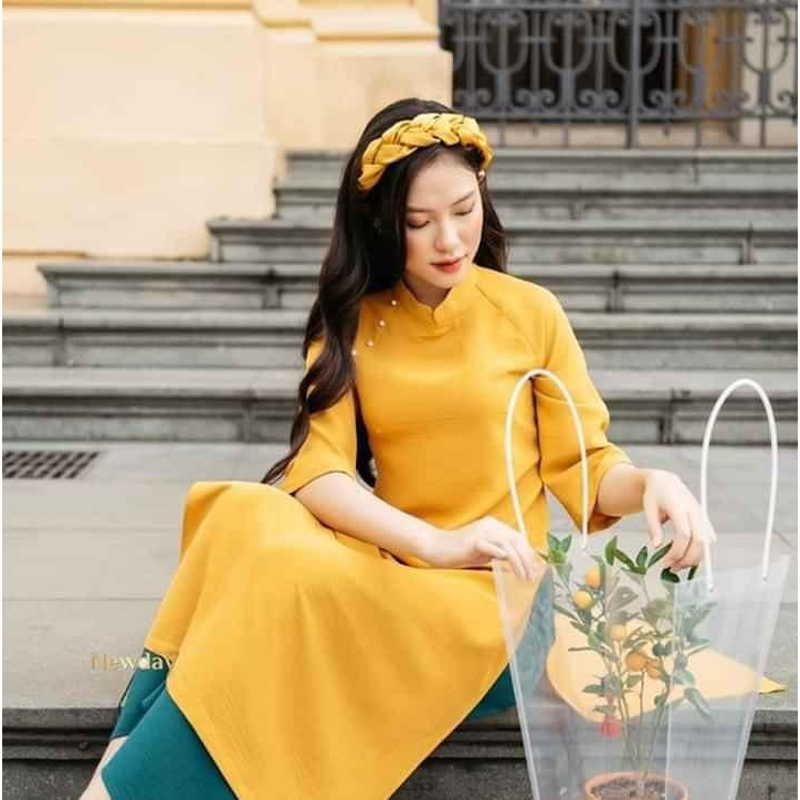Áo dài cách tân trơn dáng xuông màu xanh rêu