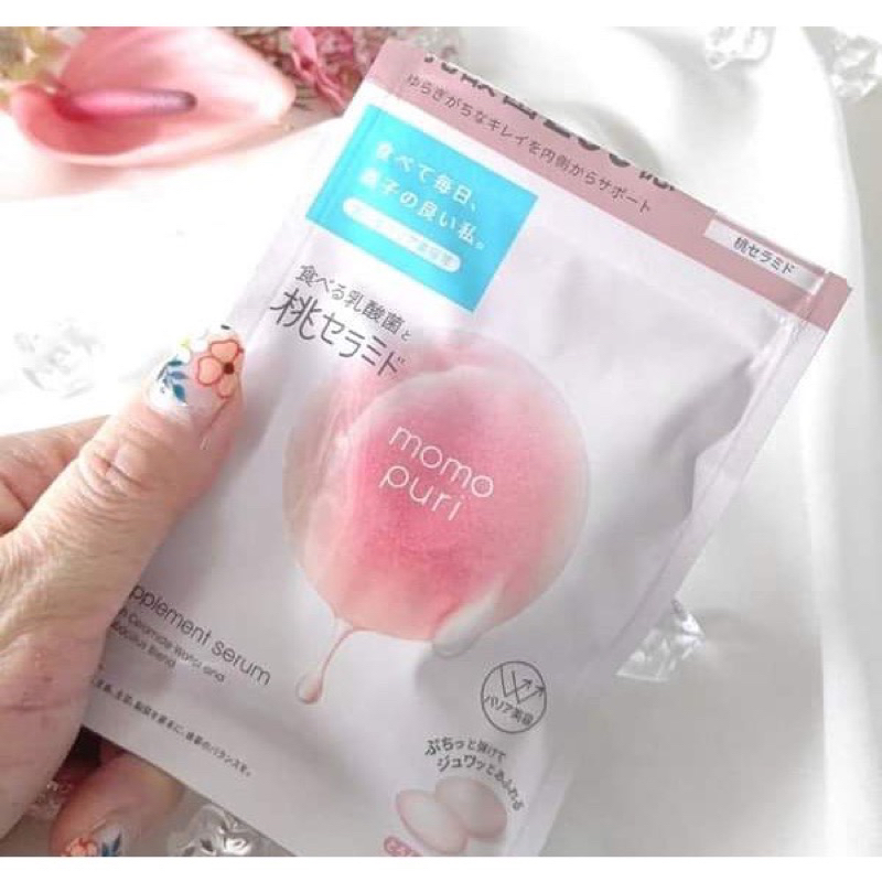 VIÊN CẤP NƯỚC CĂNG MƯỚT ĐÀO MOMO PURI SUPPLEMENT NHẬT BẢN