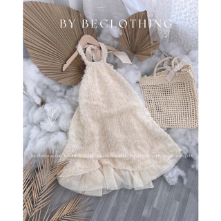 Đầm cổ yếm hở lưng lông vũ