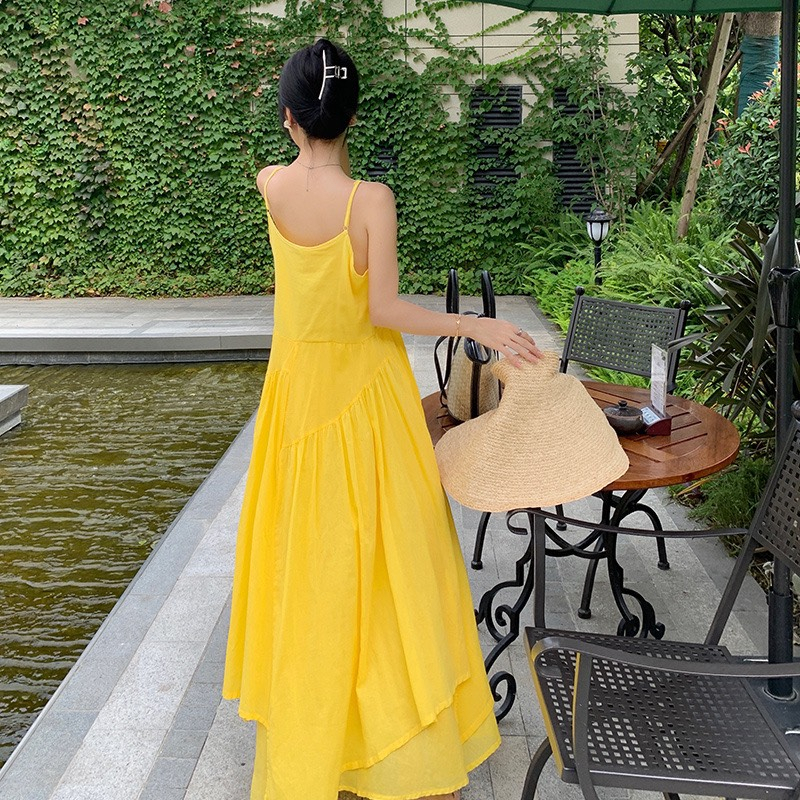 Đầm maxi vàng phong cách siêu dài