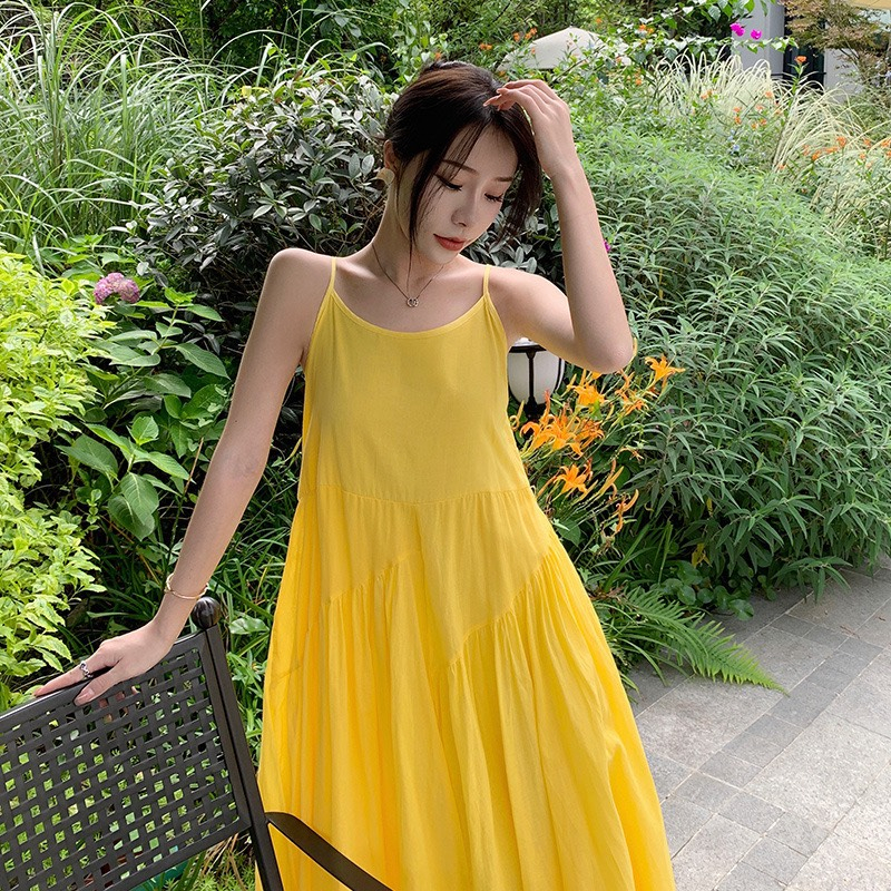 Đầm maxi vàng phong cách siêu dài