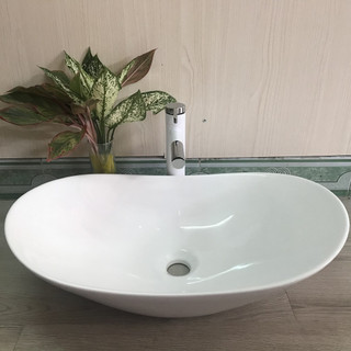 Lavabo rửa mặt đặt bàn đá hình chiếc thuyền