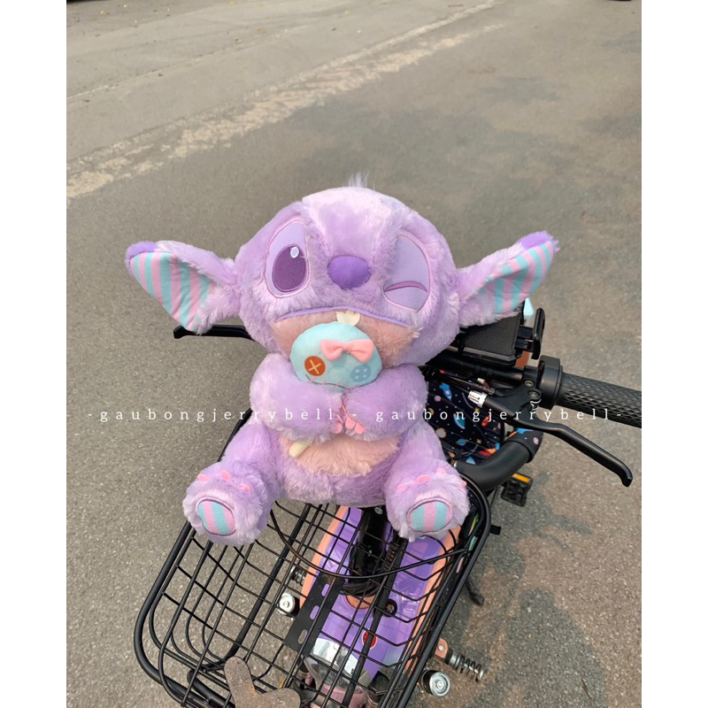 Gấu bông Stitch ôm Scrump màu tím nháy mắt