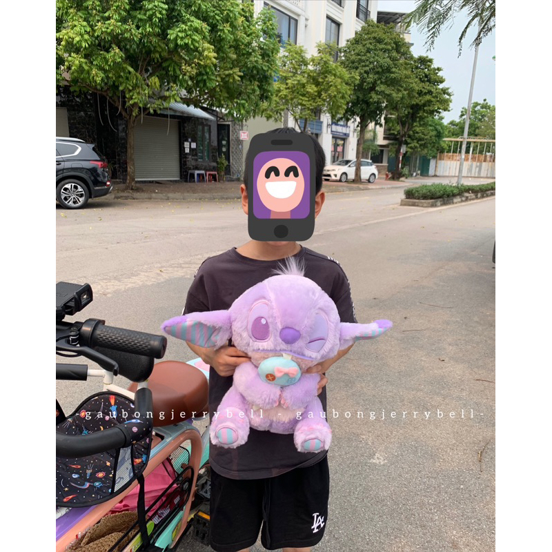Gấu bông Stitch ôm Scrump màu tím nháy mắt