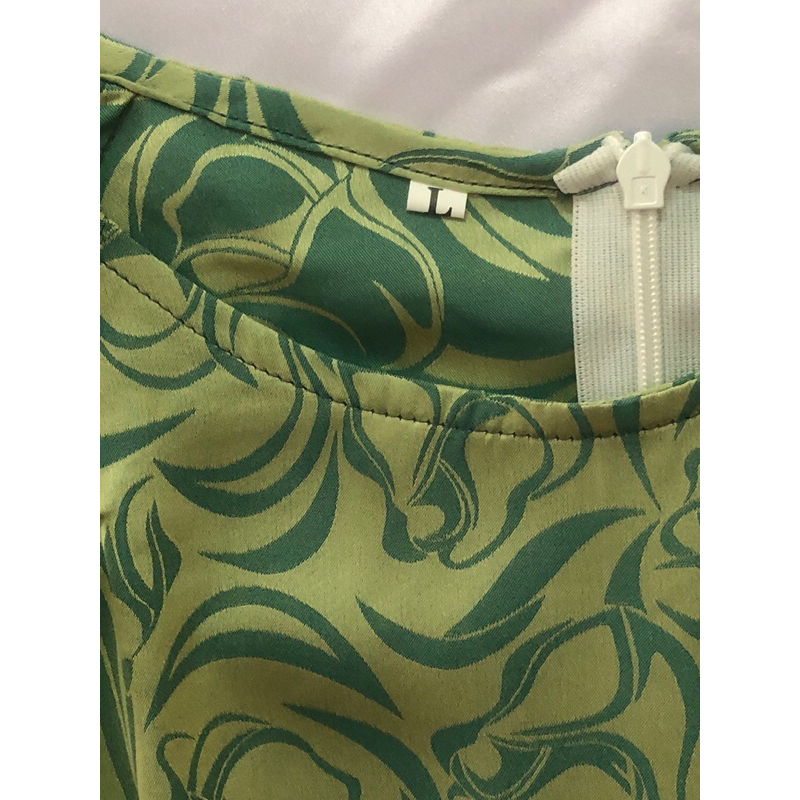 Áo dài lụa Thái Tuấn màu xanh cốm in hoạ tiết