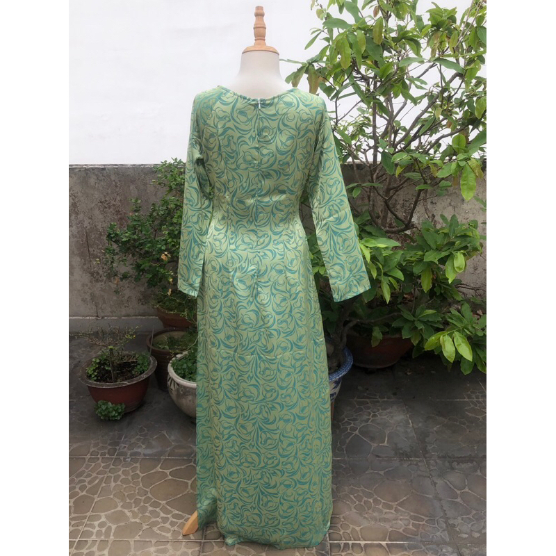 Áo dài lụa Thái Tuấn màu xanh cốm in hoạ tiết