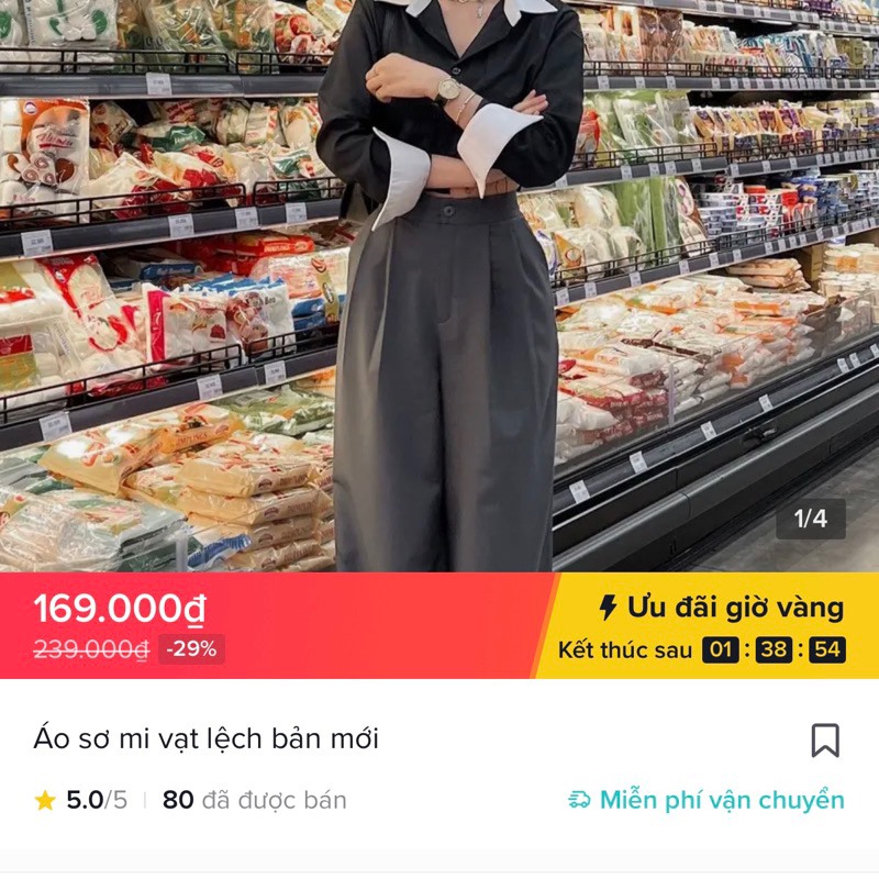 Áo sơ mi croptop vạt lệch đen phối trắng