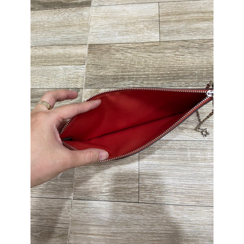 Clutch si hiệu Coach