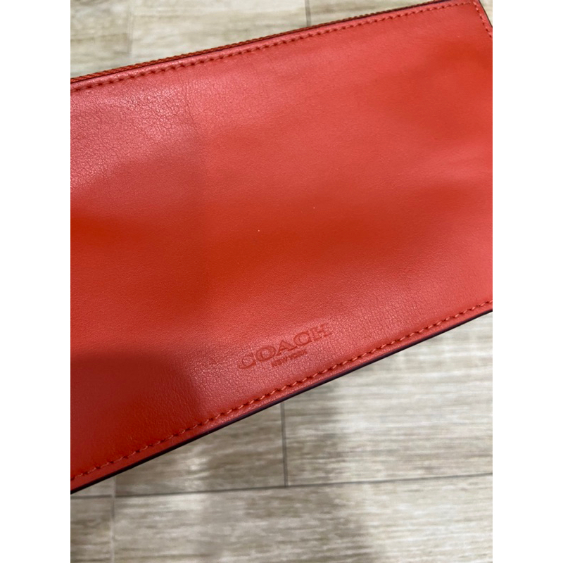 Clutch si hiệu Coach