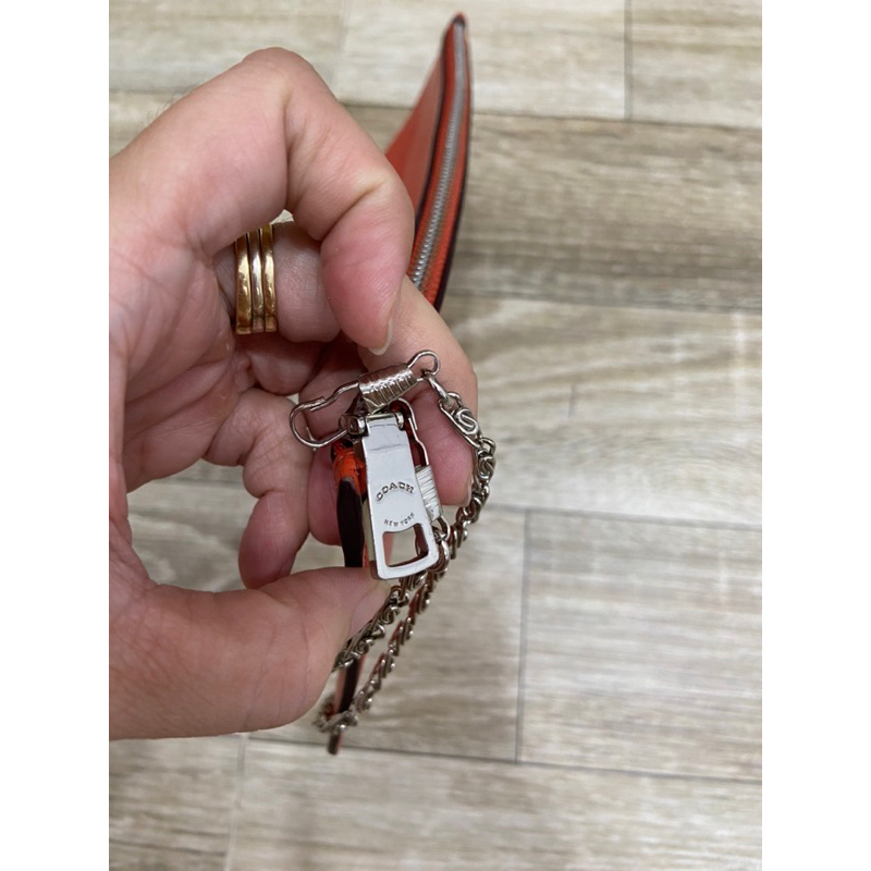 Clutch si hiệu Coach