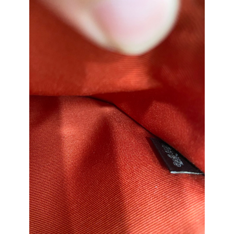 Clutch si hiệu Coach