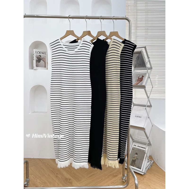 Đầm len sát nách tua rua gấu