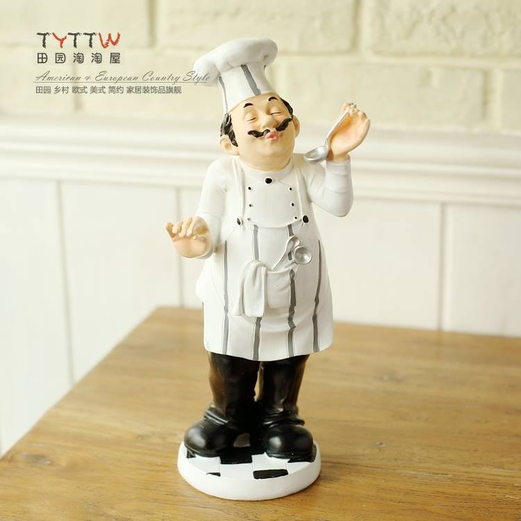 Tượng đầu bếp cầm muỗng