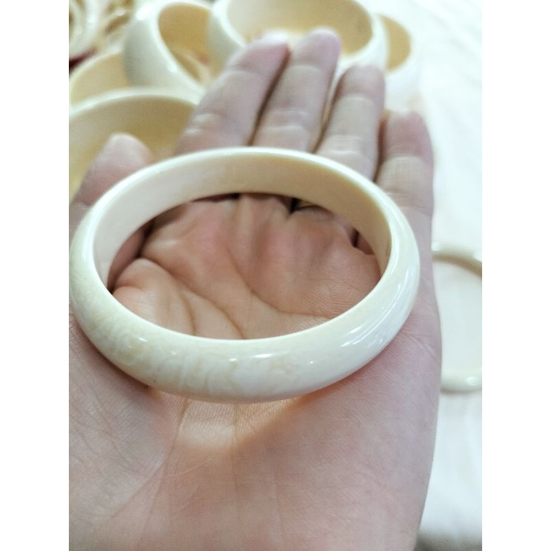 Vòng tay nam nữ, em bé nhựa giả ngà đeo bình an may mắn, tránh tà vía dữ