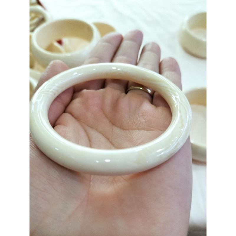 Vòng tay nam nữ, em bé nhựa giả ngà đeo bình an may mắn, tránh tà vía dữ