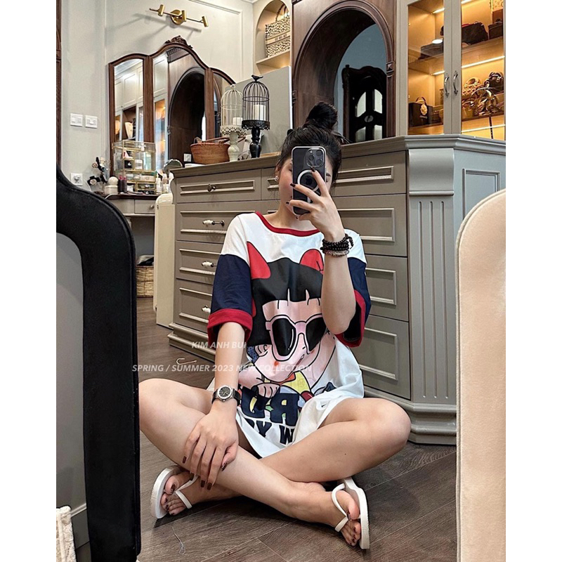 Áo phông cô bé nơ đỏ