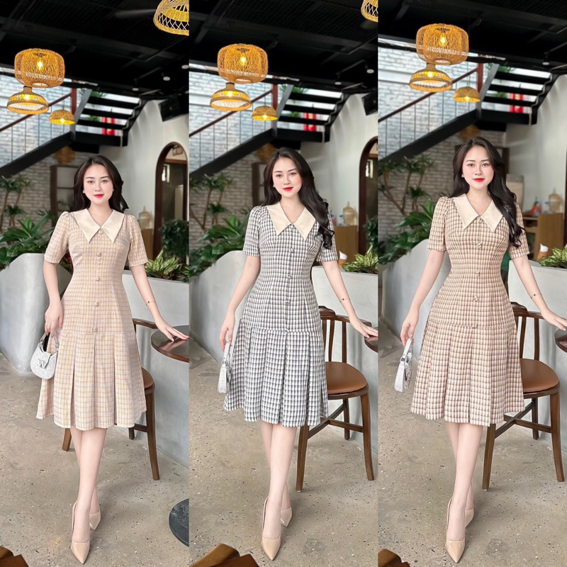 Váy kẻ đuôi cá cúc bọc