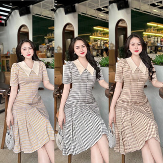 Váy kẻ đuôi cá cúc bọc