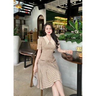 Váy kẻ đuôi cá cúc bọc