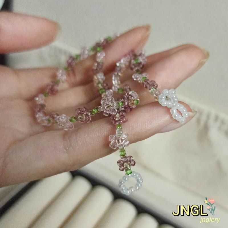 Vòng cổ kết hoa hạt cườm màu tím mã N012