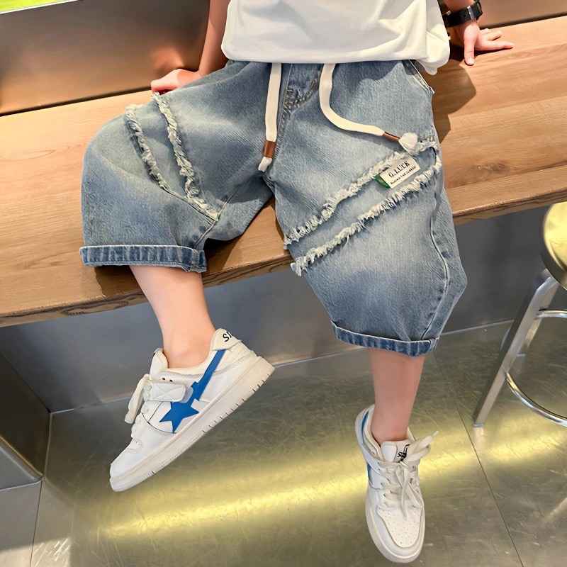 Quần bò lửng hoạ tiết tua rua, quần denim cho bé trai phong cách năng động