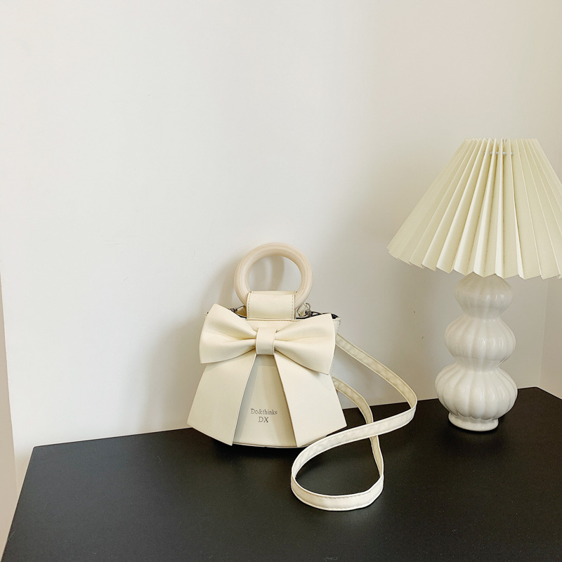 Túi xách đéo chéo, cầm tay, da PU gắn nơ xinh xắn cho nữ