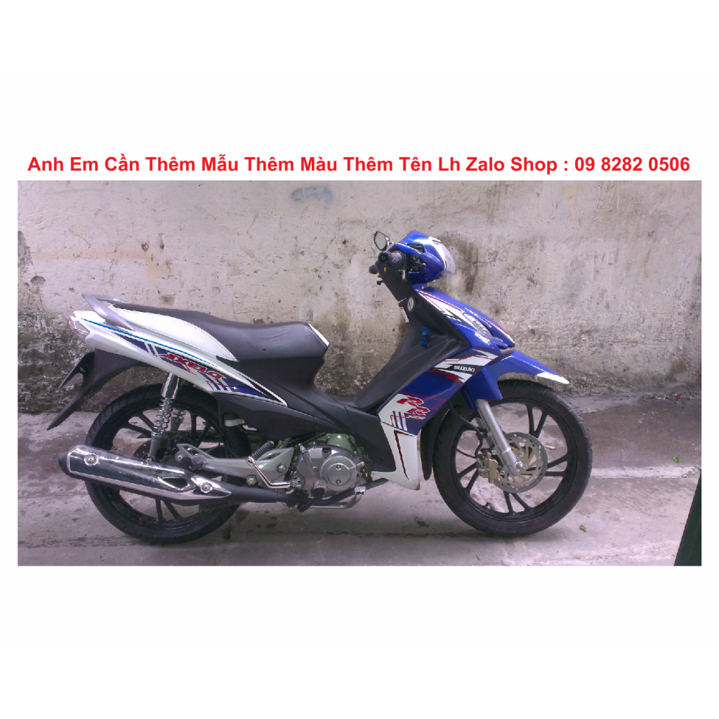 TEM AXELO ZIN XANH TRẮNG