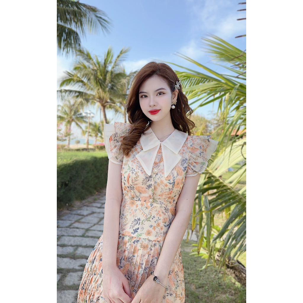Đầm hoa cánh tiên dáng xòe dập ly cổ cánh bướm, đầm mặc đi du lịch cực sang chảnh