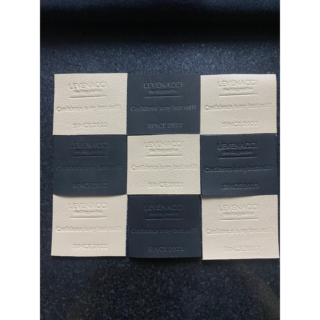 Áo Polo Màu Kem - Thêu Logo - Mác Da Bò Thật Thủ Công