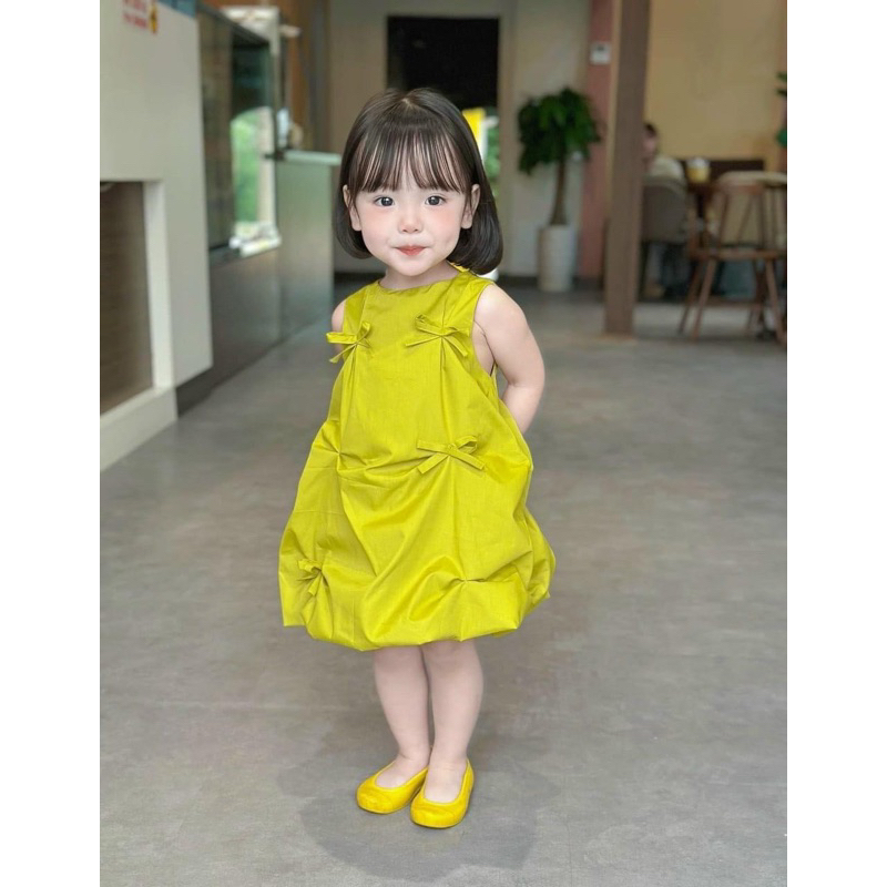 Đầm bí trắng nơ nhí