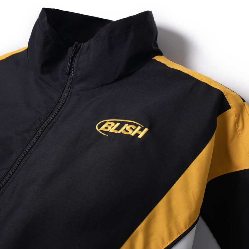 Áo khoác dù BLISH 2.0 màu đen - phối vàng/trắng.