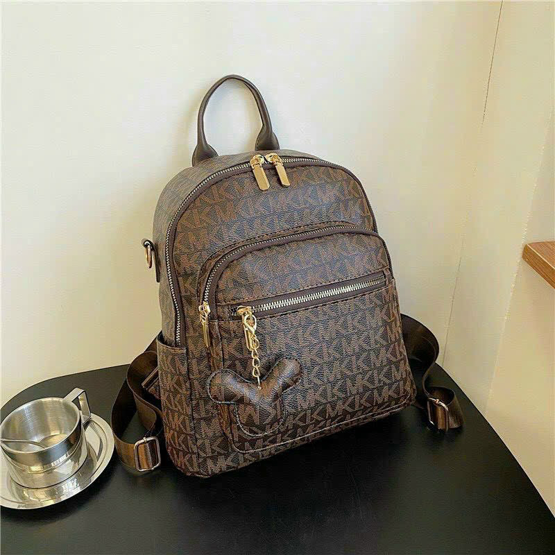 Balo đi học thời trang sz32cm hoạ tiết mkk , da dày pu chắc chắn dùng được cho các mẹ bỉm sữa làm balo bỉm sữa