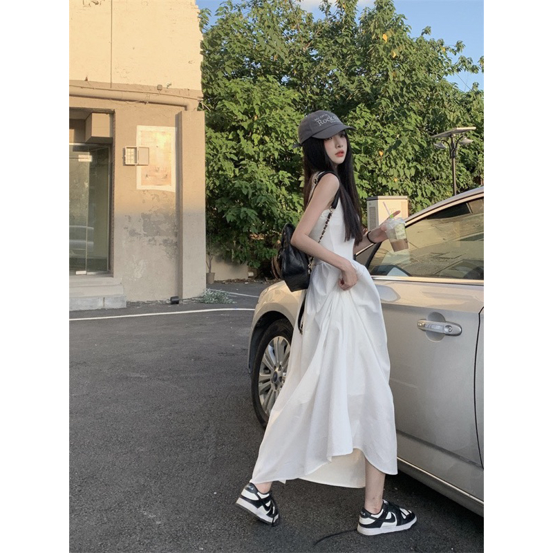 Đầm trắng midi sát nách dáng dài