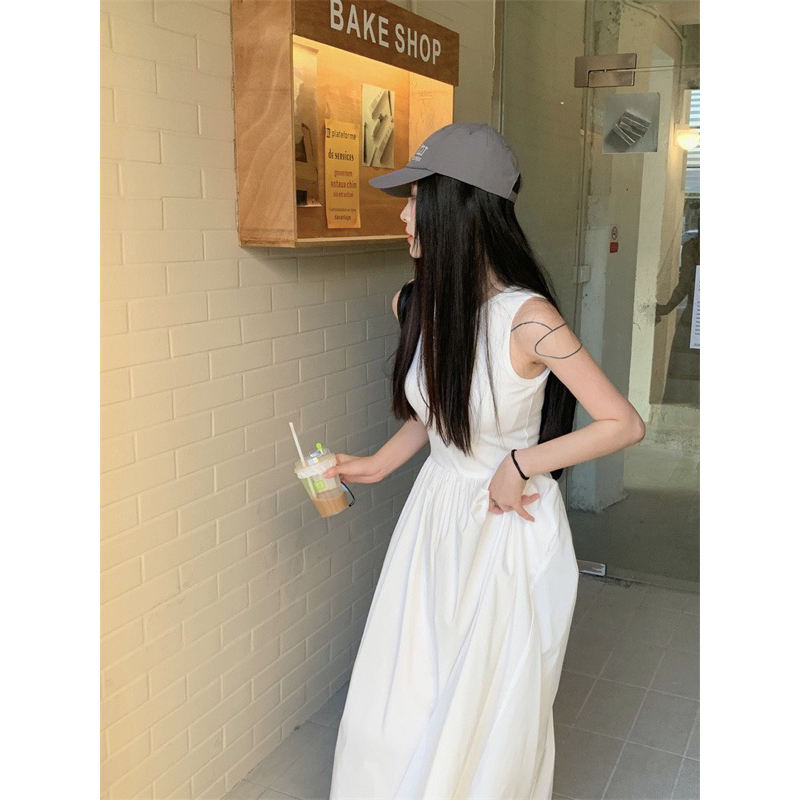 Đầm trắng midi sát nách dáng dài