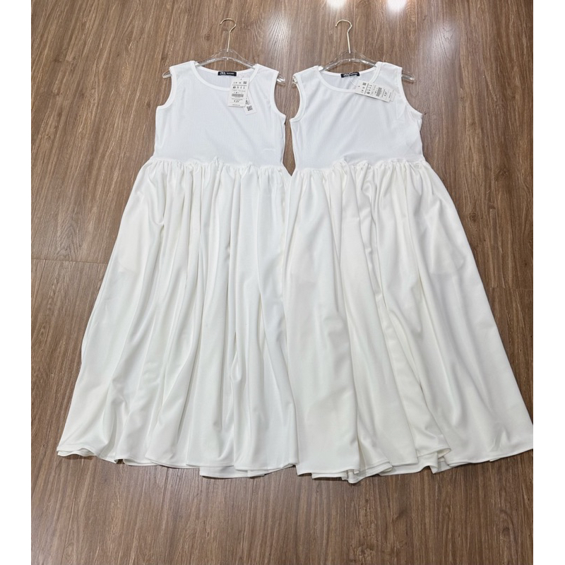 Đầm trắng midi sát nách dáng dài