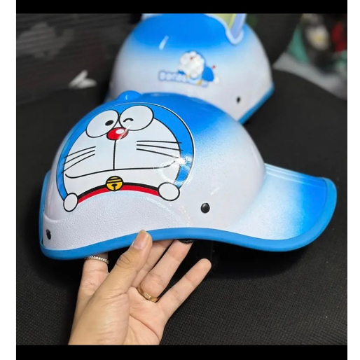 Nón bảo hiểm  hai màu kết in hình doremon cute +tặng tai mèo gắn nón
