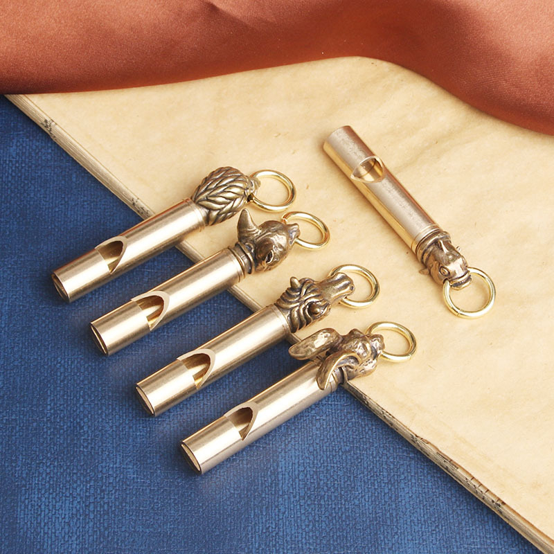 Móc khóa bằng đồng hình cái còi chim ó - Còi thổi ngon - Sản phẩm độc đáo sưu tầm.