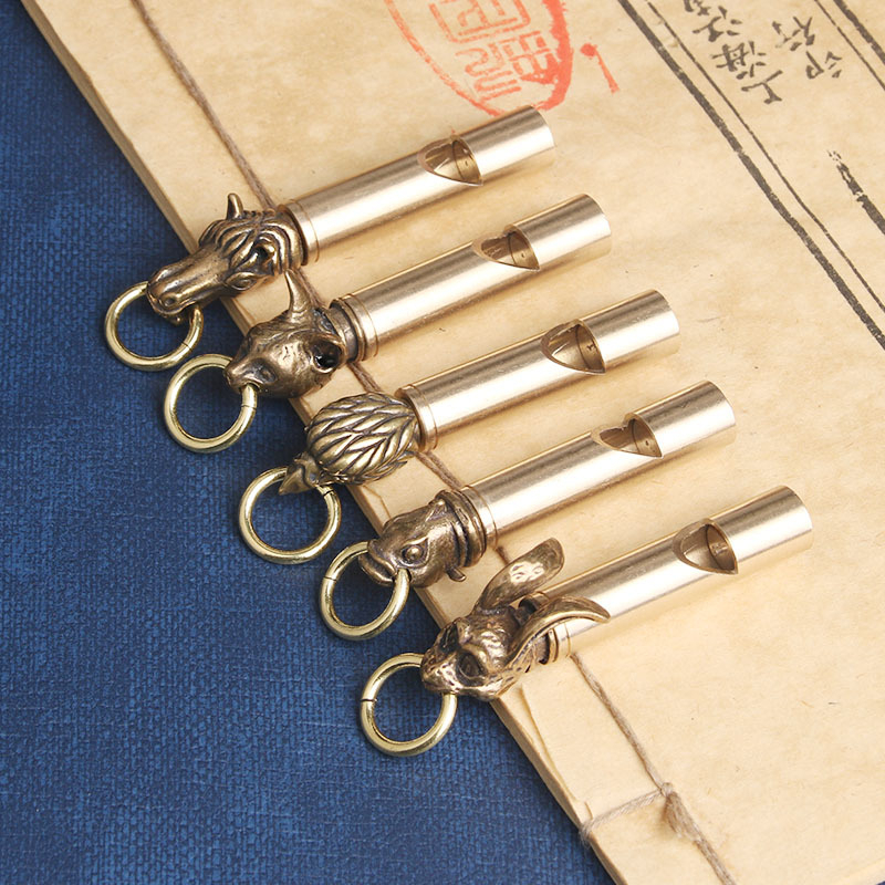 Móc khóa bằng đồng hình cái còi chim ó - Còi thổi ngon - Sản phẩm độc đáo sưu tầm.