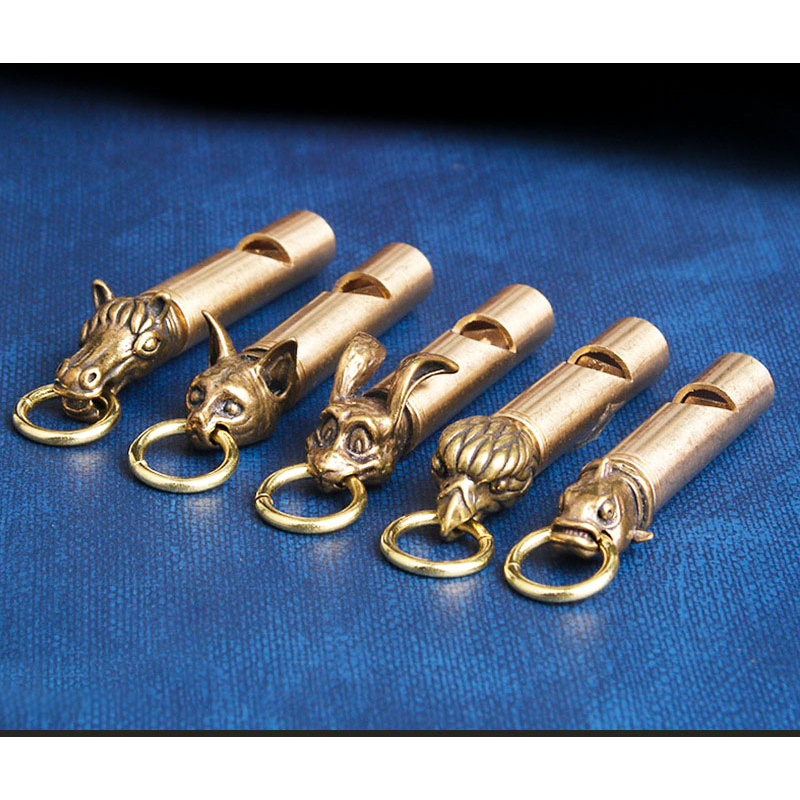 Móc khóa bằng đồng hình cái còi chim ó - Còi thổi ngon - Sản phẩm độc đáo sưu tầm.