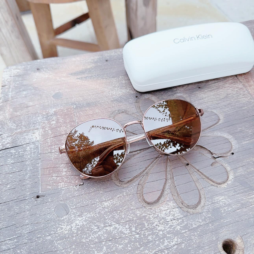 Kính mát Calvin Klein dáng tròn, gọng rose gold, mắt nâu trà CK18301SK 781