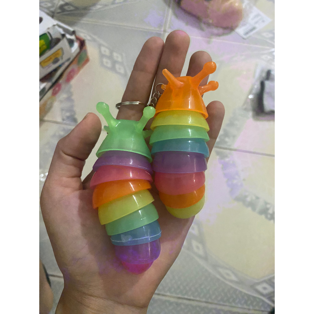 Móc chìa khoá hình con sâu mắt to loại đẹp có đèn phát sáng con ốc sên