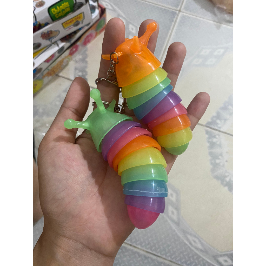 Móc chìa khoá hình con sâu mắt to loại đẹp có đèn phát sáng con ốc sên