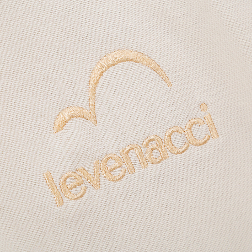 Áo Polo Màu Kem - Thêu Logo - Mác Da Bò Thật Thủ Công